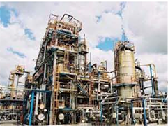 Figure 1: (a) Typical industrial facility, consisting of pressure equipment (vessels and piping)